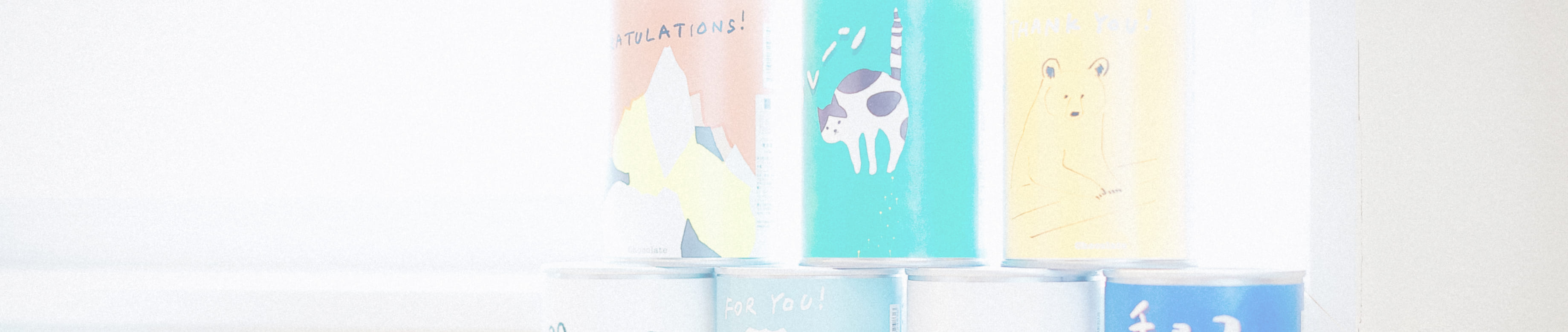 動物イラストの描かれた缶